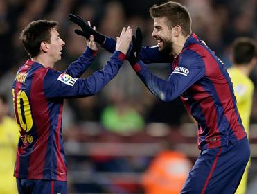 Little and Large: Gerard Pique has a job to do at both ends for Barcelona